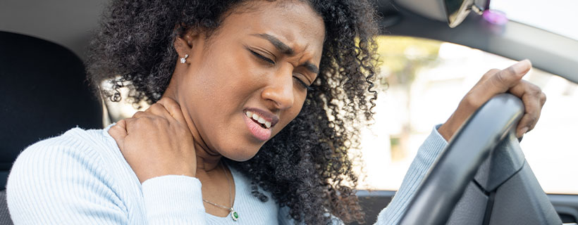 patient with neck pain in need of auto accident injury care in New Braunfels